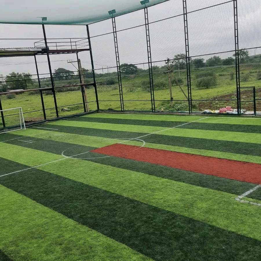 Football turf with surrounding nets