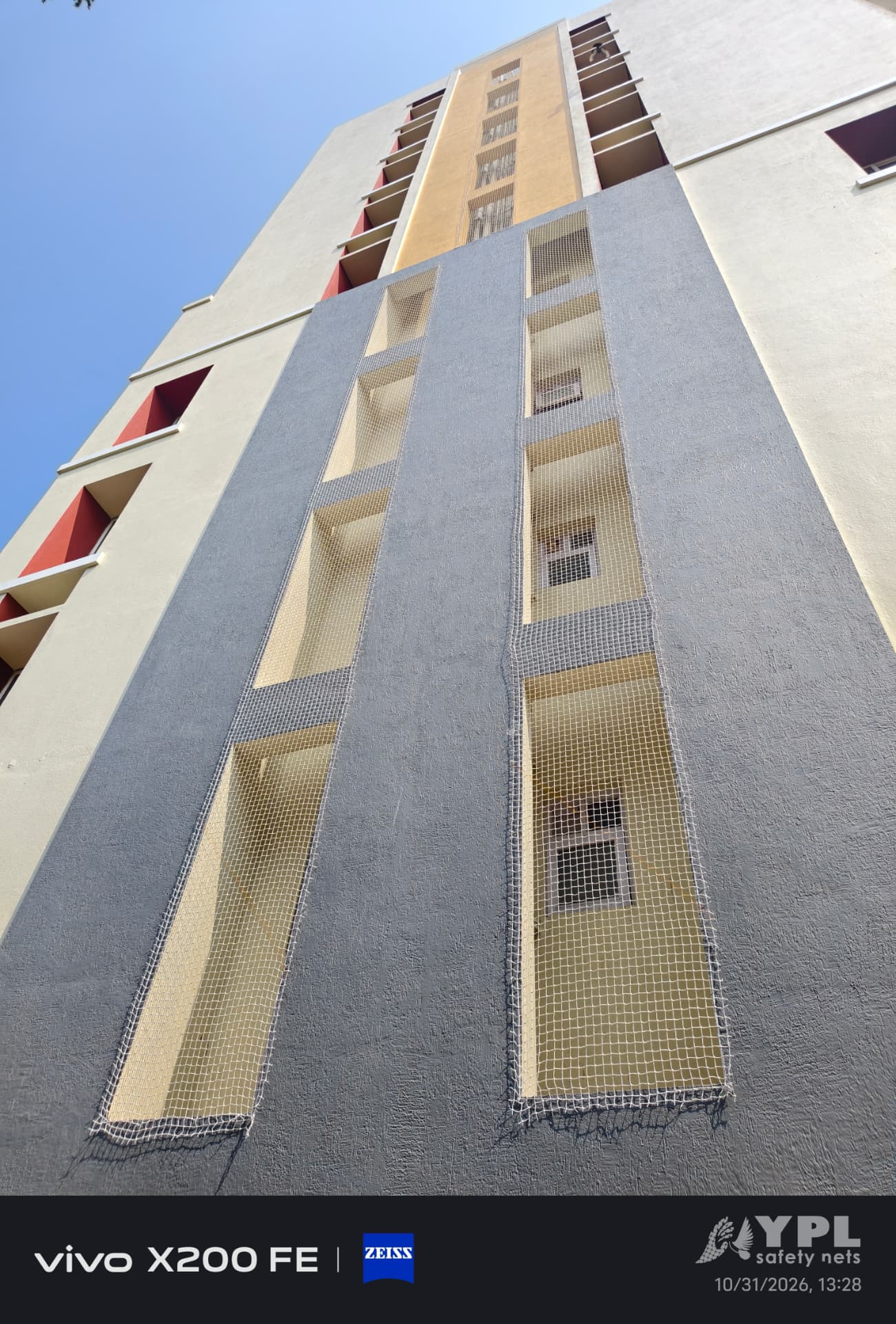 Second view of the duct-area pigeon nets at Ramaniyam Pushkar Phase 1 — owner-supplied YPL work photo, 31 October 2026