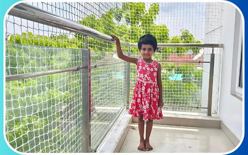 Children safety net installed across an open balcony to protect kids from falls in Pallikaranai
