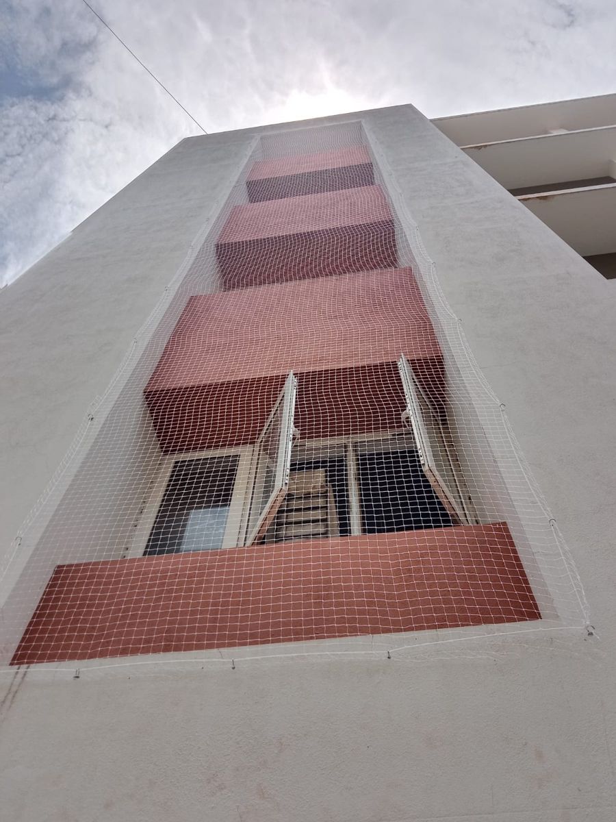 Duct area pigeon net covering a building shaft in Chennai, installed by YPL Safety Nets
