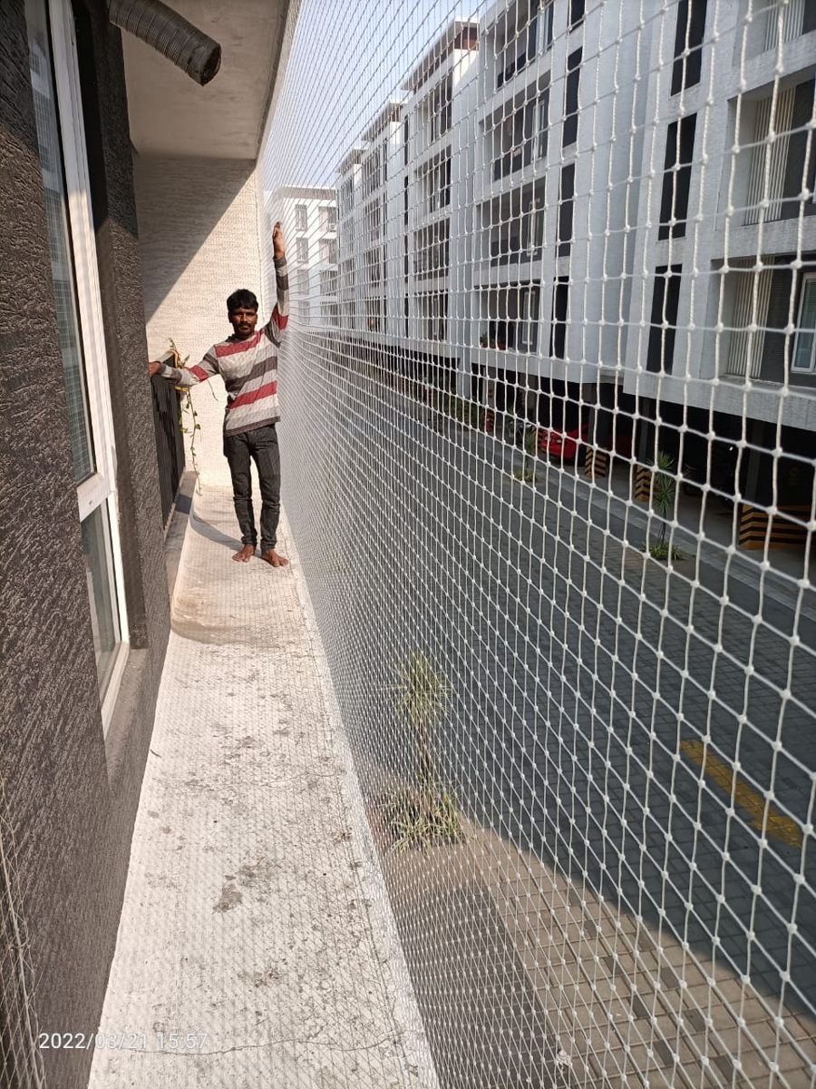 New pigeon net fitted on a Chennai apartment balcony by a YPL Safety Nets installer